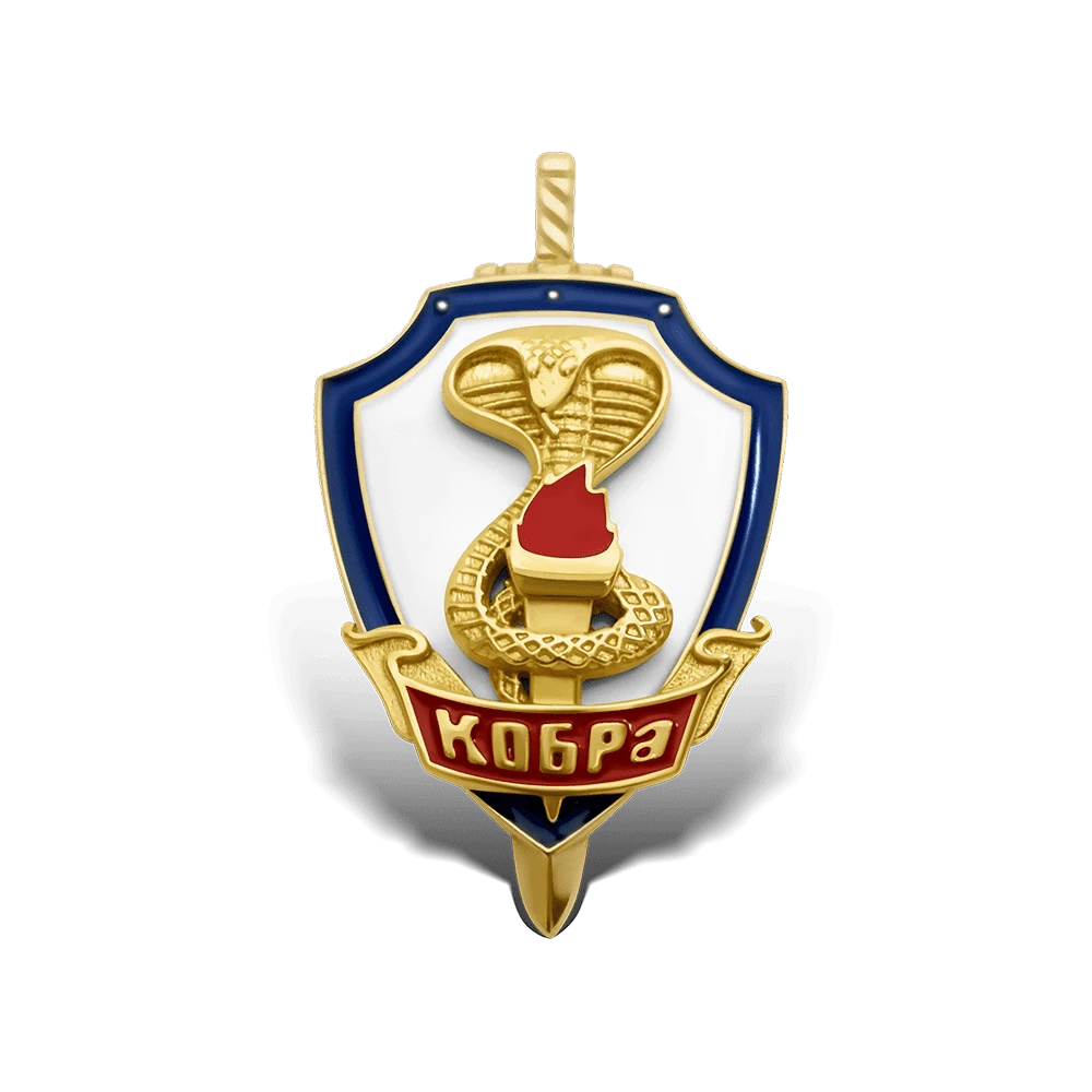 Значок с логотипом "Кобра" фото